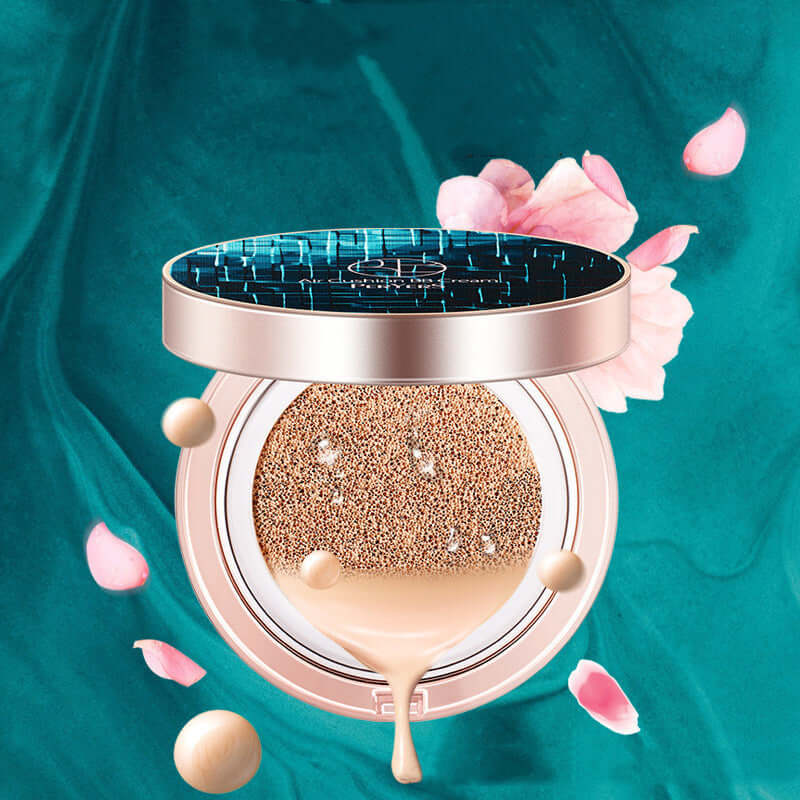 Air Protection Cream Liquid Foundation compact with ivory color, surrounded by flower petals on teal background.