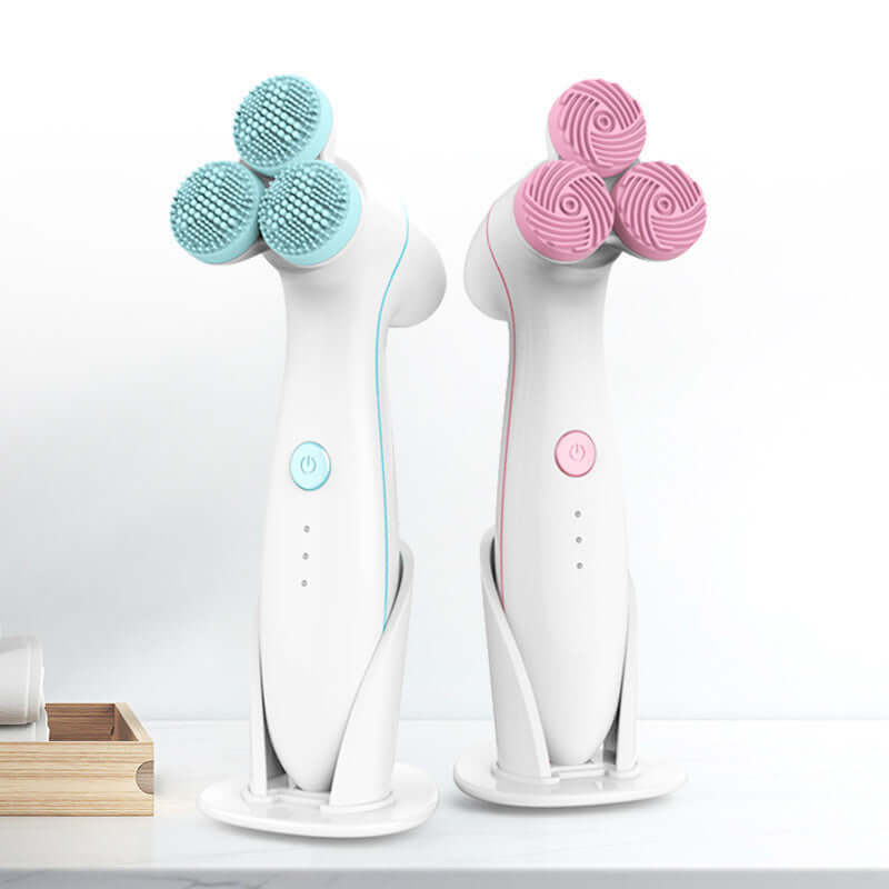 3D Smart Massager Electric Cleanser in blue and pink, featuring silicone bristles for lifting and cleansing at home.